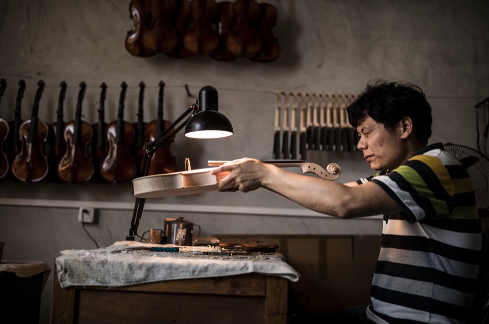 Handcrafted violin in progress at the Ming-Jiang Zhu Workshop